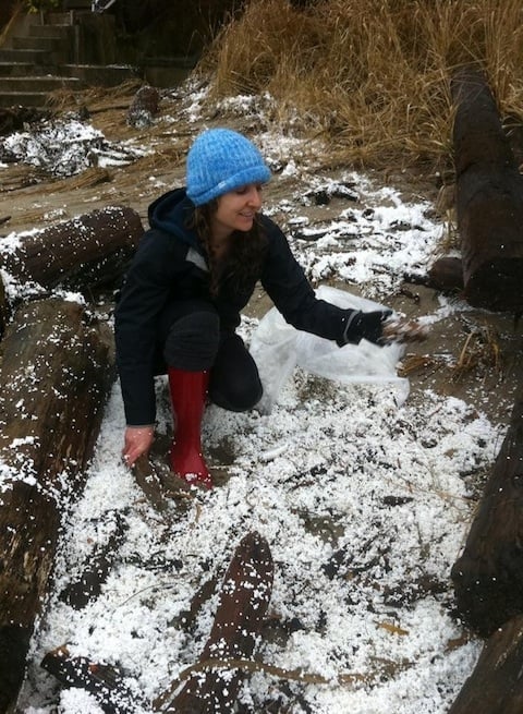 Surfrider Volunteer Elise Fields sifts through the mess